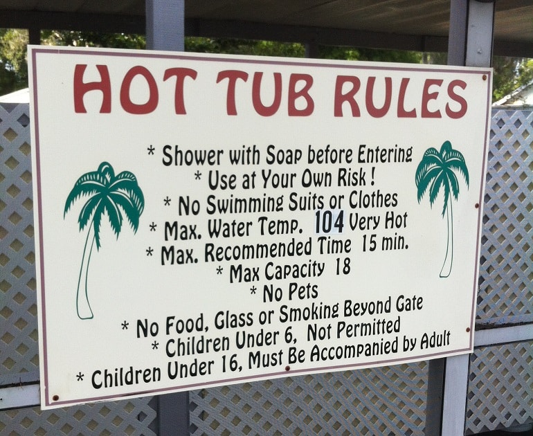 Hot Tub Rules Sign at Lake Como Nudist Resort saying to shower before enter...