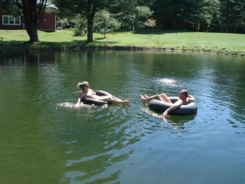 Naked tubing in the swimming pond. abbotts glen clothing optional resort nu...